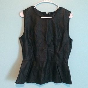 Faux leather peplum top with back zipper.